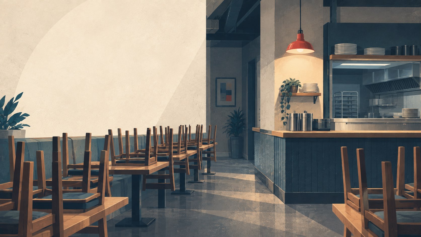 Empty restaurant dining room at closing time with chairs stacked and one light on over the service station